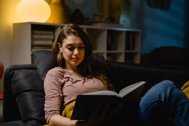 istock woman ejoying evening alone at home 1425836356