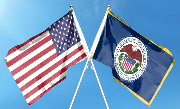 istock Twin Flags USA and Federal Reserve System, Fed Waving Flags with Textured Background 1425836612