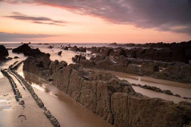 istock beachlandscape at sunset in the basque country, spain 1425843570