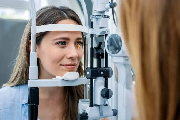 Doctor and patient in ophthalmology clinic