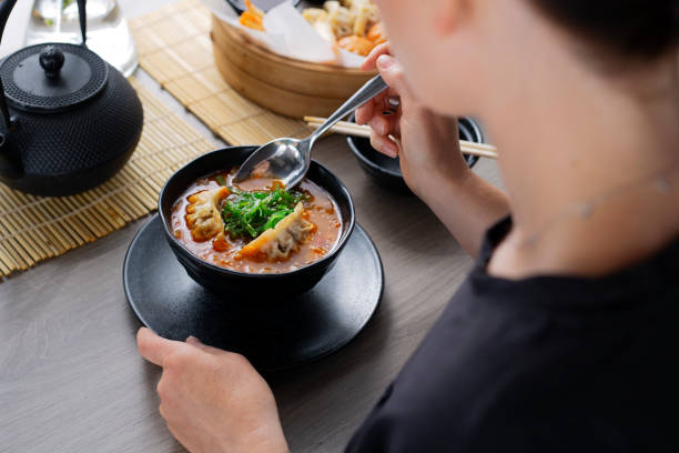 istock Woman eat japanese soup 1425856936