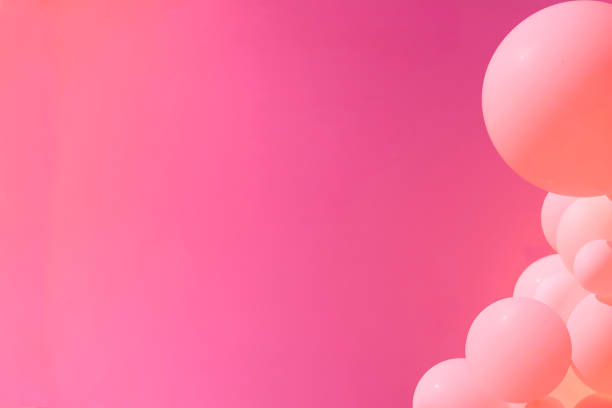 istock Festive pink background with light balls.Space for text. 1425857167