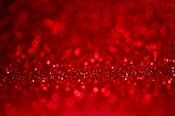 istock Abstract blur red glitter background card for Valentine's day, christmas and wedding celebration. Love bokeh sparkle confetti textured layout. 1425858876