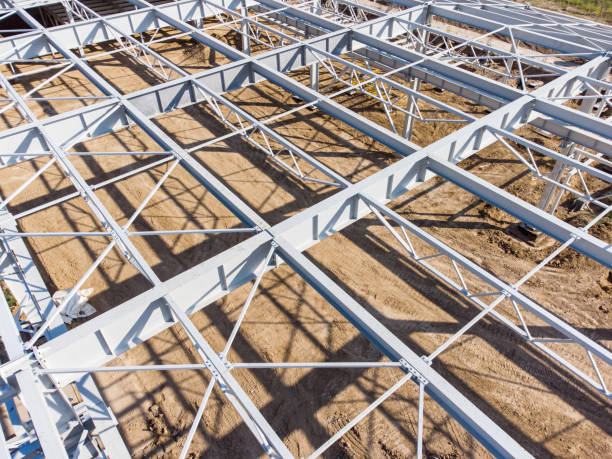 Aerial view of warehouse construction from steel metal structure. Frame of modern hangar or factory construction site. stock photo