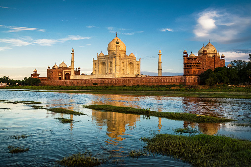 View of Taj Mahal palace reflected on Yamuna river in Agra, Uttar Pradesh, India