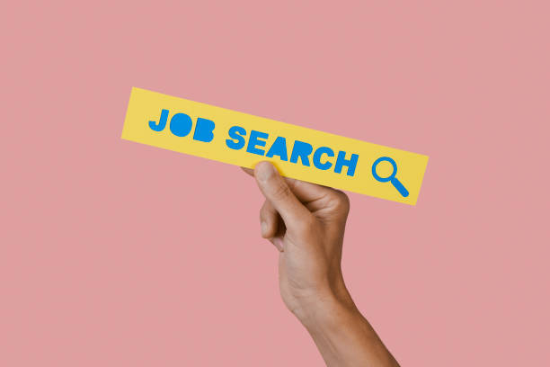 istock man holds a signboard with the text job search 1425863678