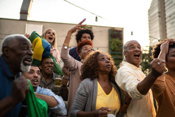 istock Brazilian team fans celebrating on a rooftop bar 1425865882