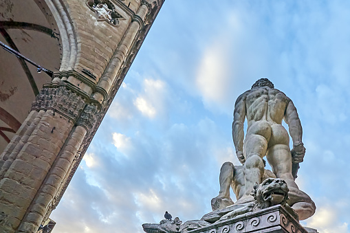 Florence, Italy - Spetember 06, 2022: Statue of Hercules in Piazza della Signoria in front of the Palazzo Vecchio in Florence. On the left part of the Loggia dei Lanzi.