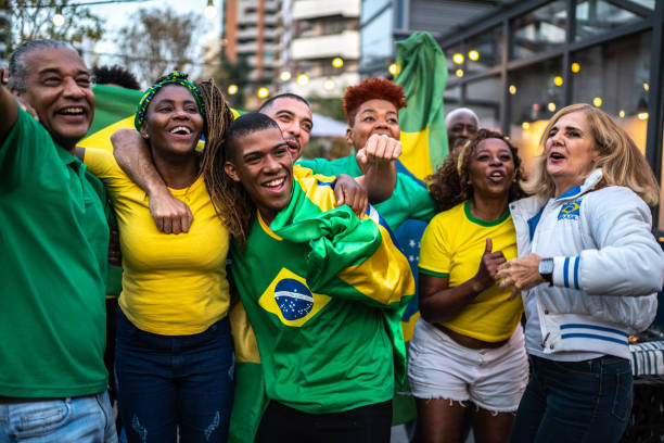 istock Brazilian team fans celebrating on a rooftop bar 1425867256