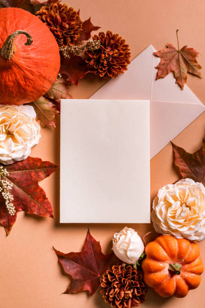 istock blank card, autumn pumpkins and flowers 1425867875