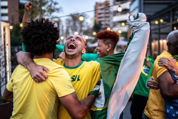 istock Brazilian team fans celebrating on a rooftop bar 1425868285