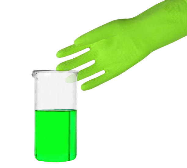 istock Green glove and a test tube 1425868551
