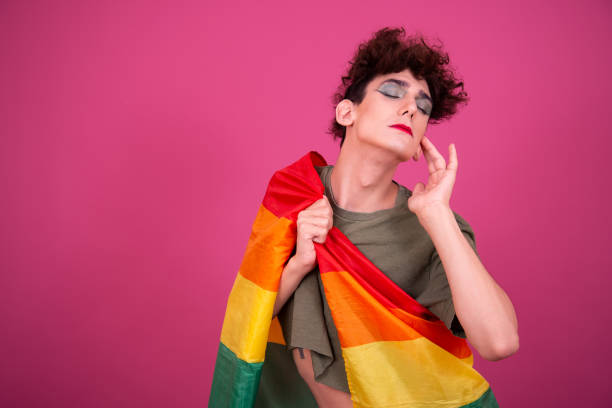 istock Happy guy with a gay flag in his hands. 1425869579