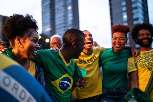 istock Brazilian team fans celebrating on a rooftop bar 1425871043