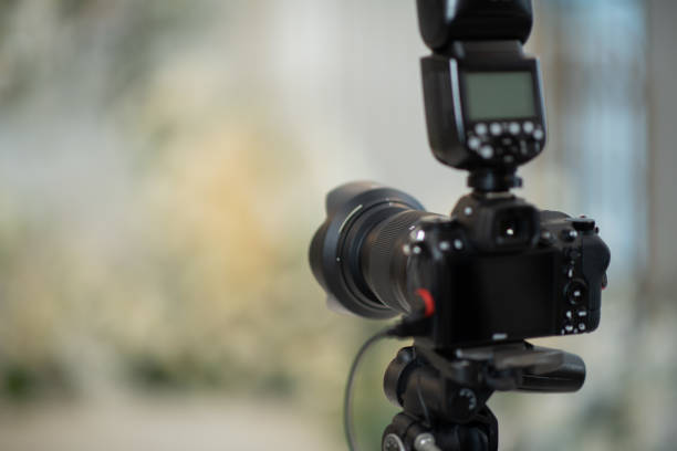 istock professional photographer, closeup digital camera 1425871223