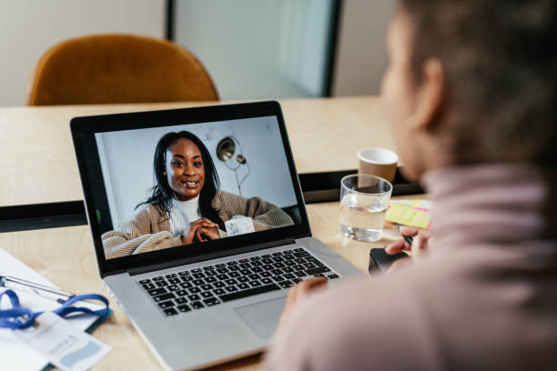 istock Employee having video call with colleagues around the world 1425873731