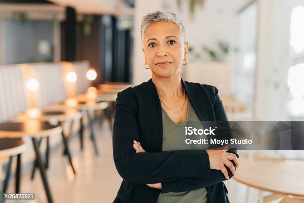 Leadership Success And A Proud Elderly Business Woman Working In A Corporate Office Tough And Assertive Mature Female Power By Company Ceo Satisfied With Her Career Goals And Management Skills Stock Photo - Download Image Now