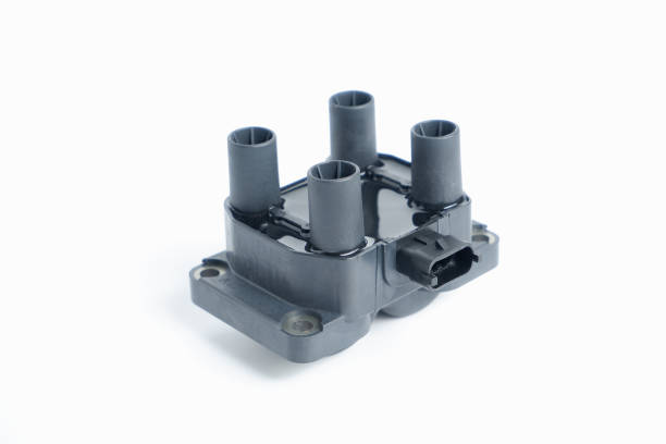 istock Auto parts. Car ignition coil on a white background close-up. Ignition coil for gasoline four-cylinder internal combustion engine 1425876109