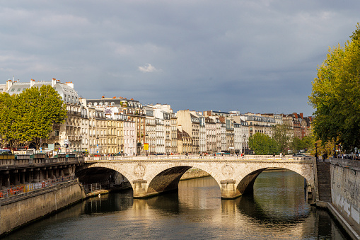 Paris scene of the river Seine and Pont Saint-Michel taken from Petit Pont - Cardinal Lustiger, Paris, France