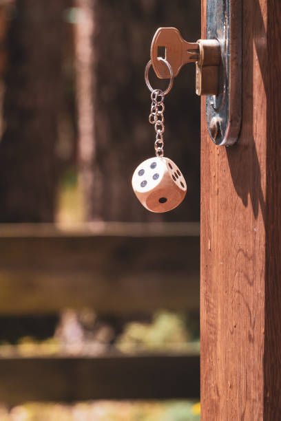 Open front door with keys in the lock - fotografia de stock