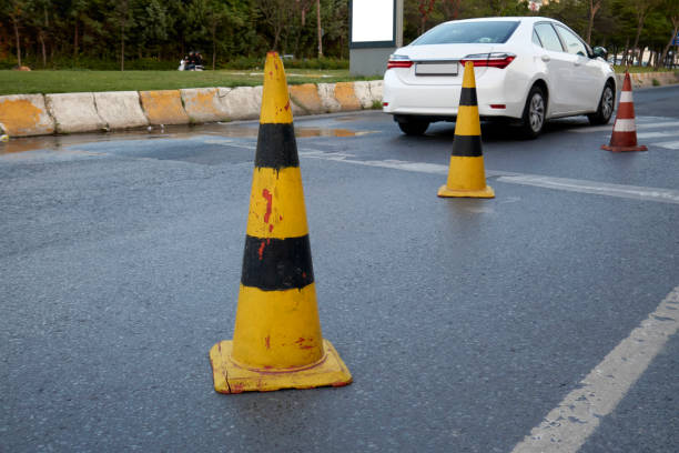 istock Yellow Traffic Cones On Road 1425880631