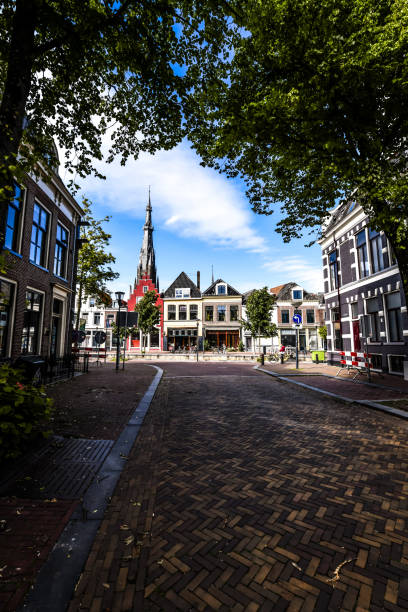 canal street near saint boniface church in leeuwarden, the netherlands - urban scene canada city winnipeg imagens e fotografias de stock