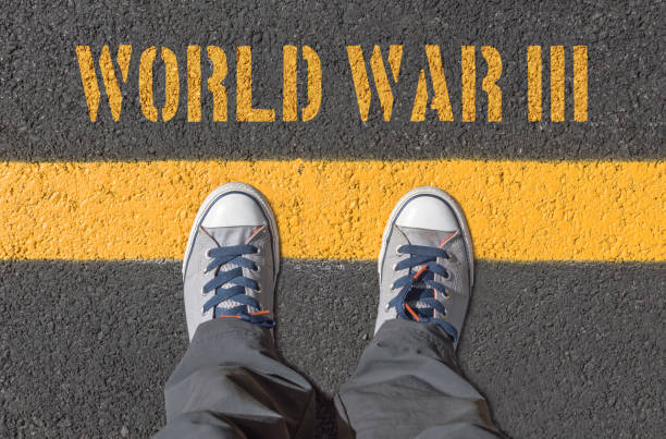 istock WORLD WAR III print with sneakers on asphalt road 1425886171