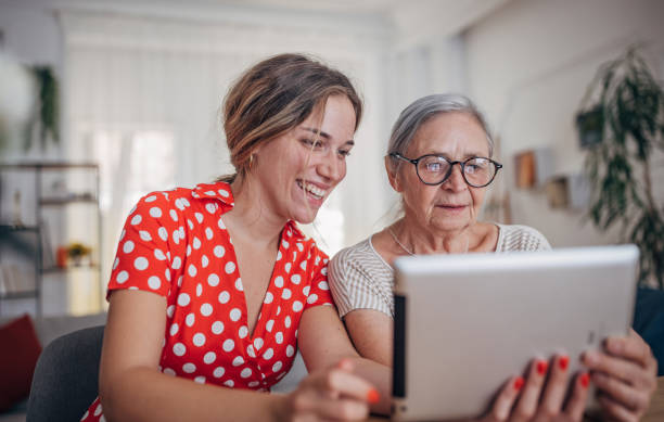istock Grandmother and granddaughter use tablet 1425889186