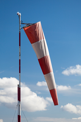 Close-up of an airfield windsock in low winds.