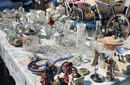 Franeker, The Netherlands - April 30 2011: Top view and closeup on various old, vintage and kitsch objects on the flea market during King's Day in the Netherlands.