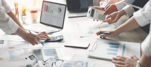 istock Business people meeting at office analyzing business growth graph,  planning strategy and brainstorming, colleagues thinking concept. 1425893798