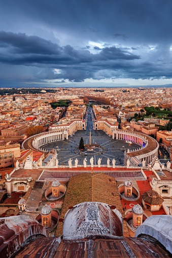 Vatican City, a city-state surrounded by Rome, Italy, from above at dusk.