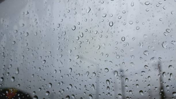 istock Water spray on glass in rainny day. 1425898175