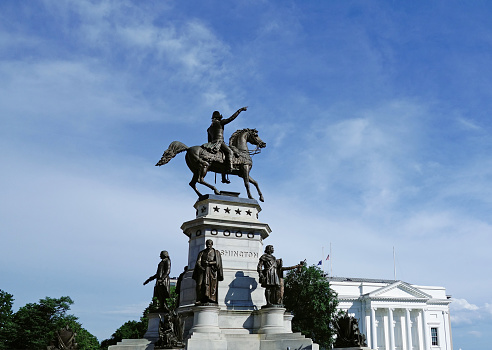 George Washington statue and the state capitol building in Richmond Virginia