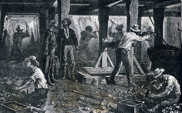 Miners working in a silver mine in the 19th century. American miners