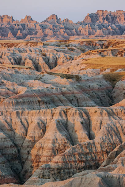 istock Badlands rock formations at sunrise 1425907949