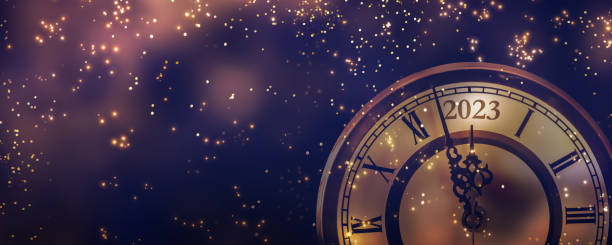 happy new year 2023 countdown clock on abstract glittering midnight sky with copy space, festive party invitation card concept for new years eve happy new year 2023 countdown clock on abstract glittering midnight sky with copy space, festive party invitation card concept for new years eve 2023 photos stock pictures, royalty-free photos & images