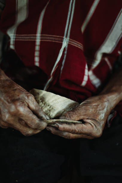istock Hmong Hilltribe Old Man Rolling Cigarette Chiang Mai, Thailand Farmer 1425914938