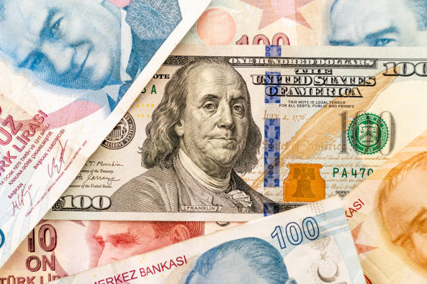 istock Close up 100 Dollars bill and Turkish Liras. 1425918634