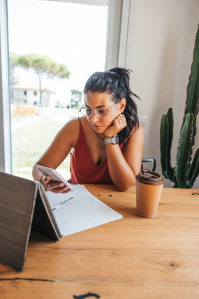 istock Millennial studying taking part ot a online class from home 1425921464