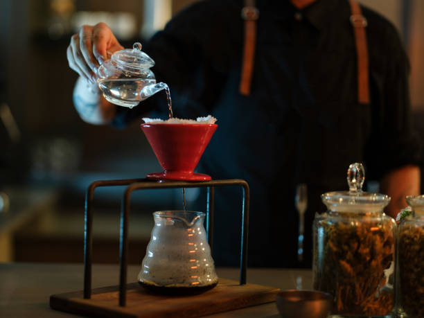 istock a barista brewing coffee in a cafe 1425926575