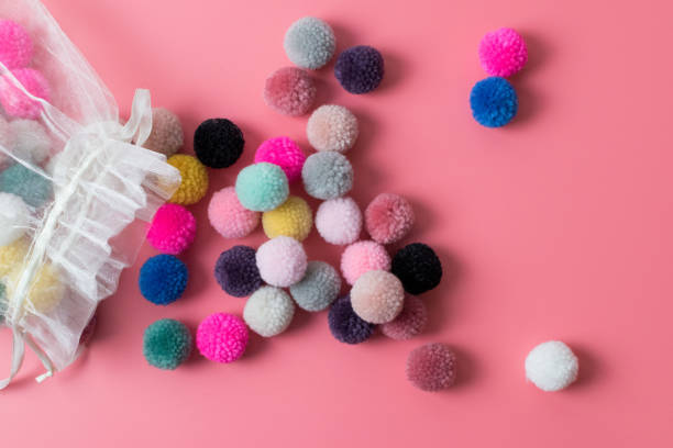 Pompoms made from wool yarn for hobby and craft use stock photo