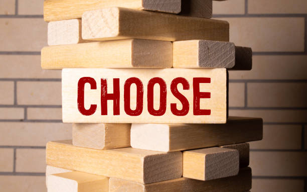 istock Word CHOose made with wood building blocks 1425927217