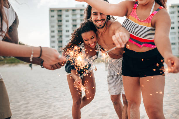 istock friends doing a party at the beach 1425930132