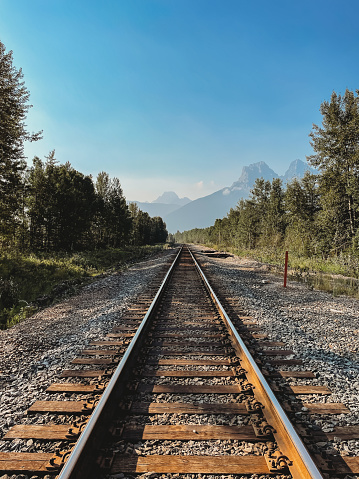 Train tracks through the Rocky Mountains in Canmore, Canada. in Canmore, Alberta, Canada