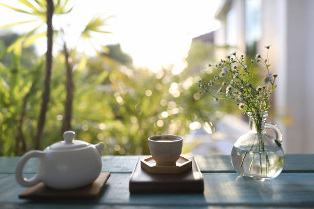 istock Tea pot and tea cup and White Marguerite flower 1425939112