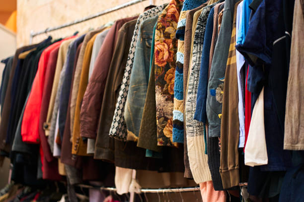 istock Hanger with free clothes in humanitarian centre 1425940468