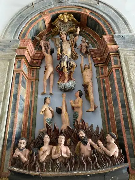 Photo of Side altar, sculpture of the lost souls, Church of Saint Benedict, Viana do Castelo, Portugal.