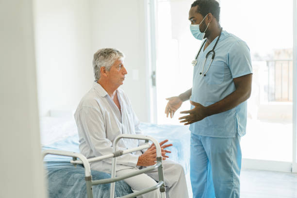 istock Senior man gets physical therapy at home 1425949830