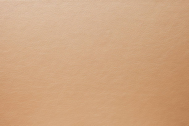 Abstract luxury gold-beige leather texture for background. Color leather for work design or backdrop product. stock photo